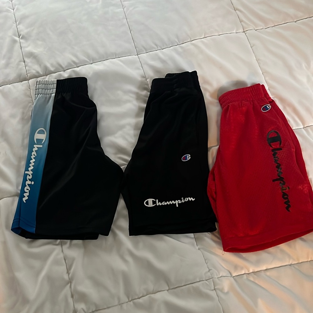 Three pairs boys Champion basketball shorts size small, they do run big